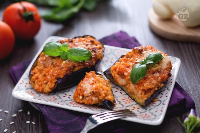 Cheesy rice-stuffed eggplant - Italian recipes by GialloZafferano