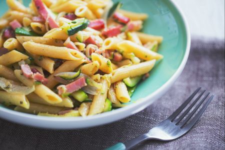 Penne with speck and zucchini