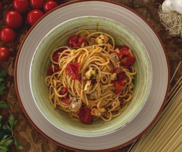 Spaghetti all'acqua pazza (with fish and cherry tomatoes)