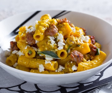 Pasta with peppers, sausage and feta