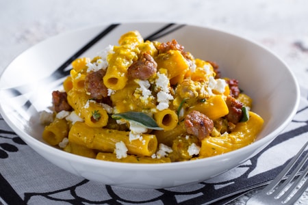 Pasta with peppers, sausage and feta