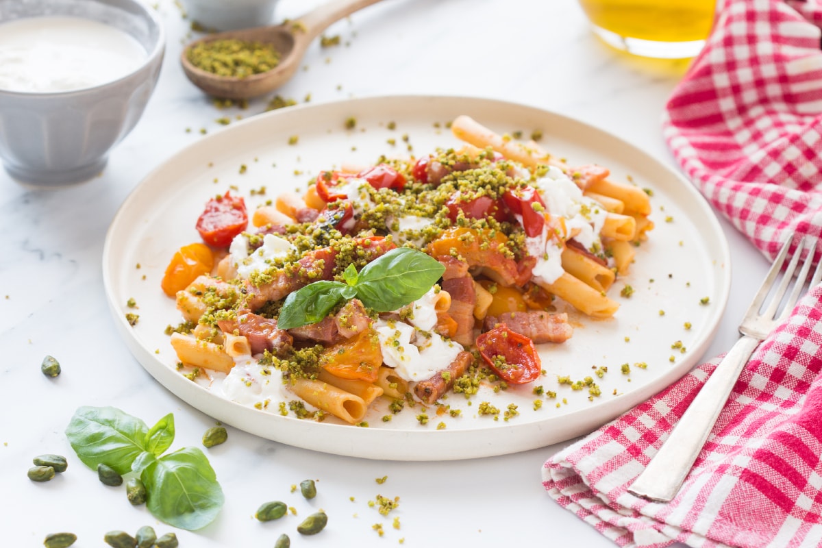 Ziti with tomatoes, bacon, and stracciatella