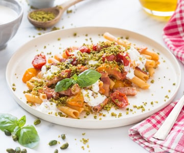 Ziti with tomatoes, bacon, and stracciatella