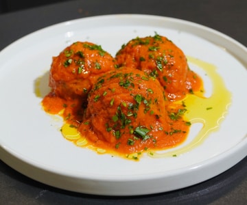 Eggplant meatballs with buffalo mozzarella in tomato sauce