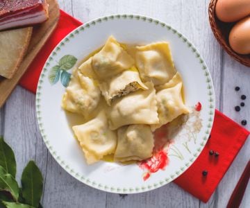 Ravioli with capon broth