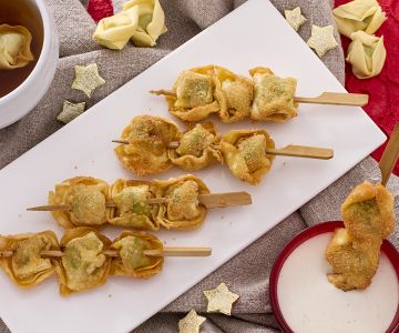 Fried Tortellini Skewers with Cream and Parmesan Sauce