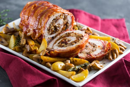 Roast stuffed with plums and walnuts with mustard