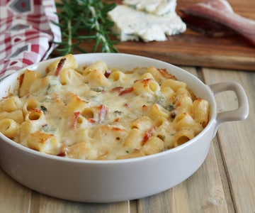 Baked pasta with speck and gorgonzola