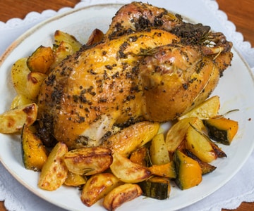 Roast guinea fowl with potatoes and pumpkin