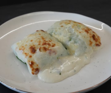 Green crepes with ricotta and spinach filling