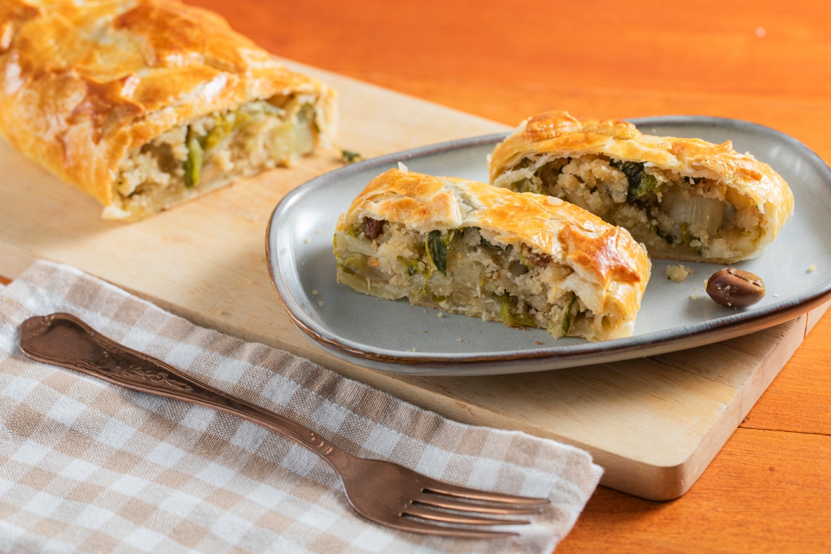 Potato and escarole strudel with raisins and pine nuts