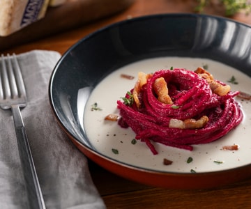 Beetroot Spaghetti, Castelmagno Cream, and Guanciale