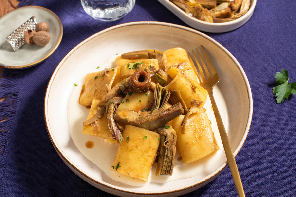 Paccheri with artichokes, pecorino cream, and anchovies