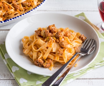 Tagliatelle with spring onions and sausage