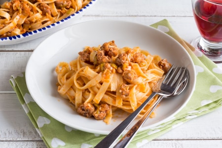 Tagliatelle with spring onions and sausage