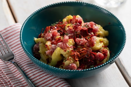 Pasta with leek cream, saffron, and Bra sausage