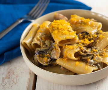 Paccheri with artichokes, clams, and bottarga